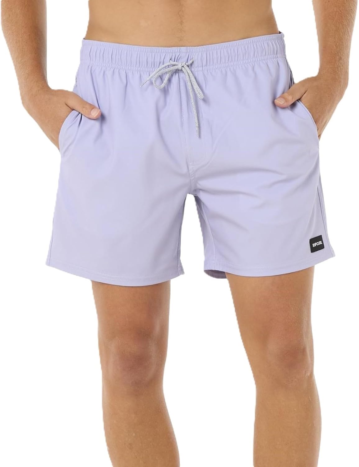 Pantaloncini RIP CURL viola su sfondo naturale
